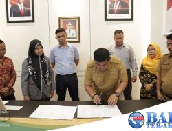 Pj Bupati Bangka M. Haris Tandatangani NPHD Dana Pemilukada 2024,